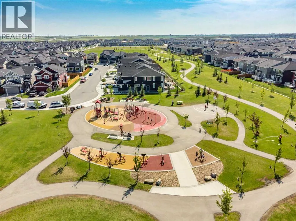 203, 130 Redstone Walk NE
