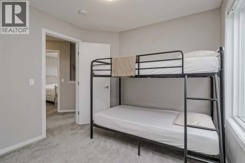 203, 130 Redstone Walk NE