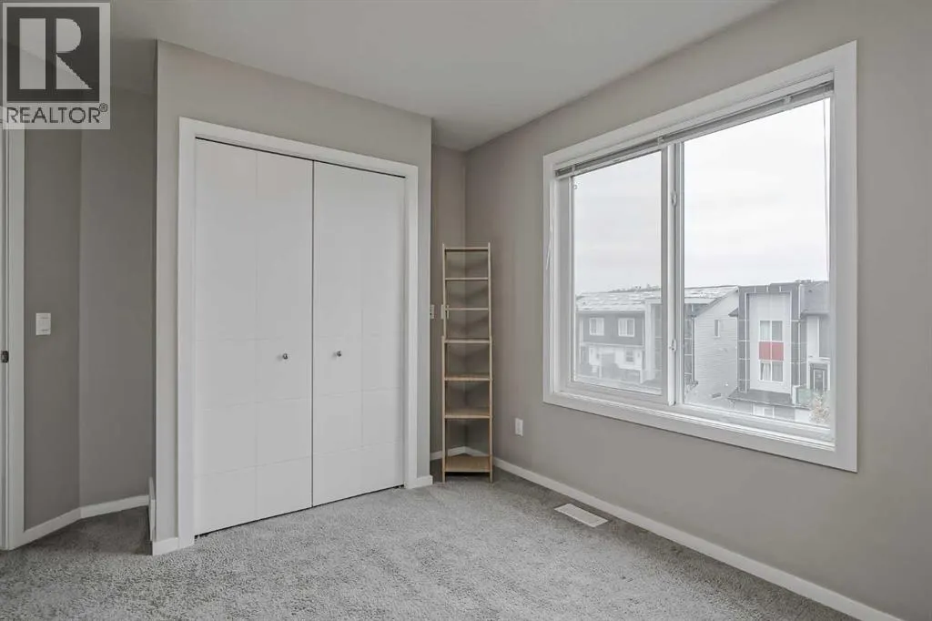 203, 130 Redstone Walk NE