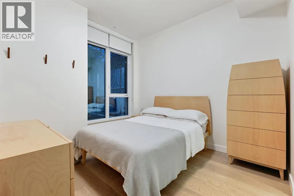 104, 128 Waterfront Court SW