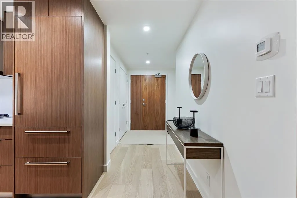 104, 128 Waterfront Court SW