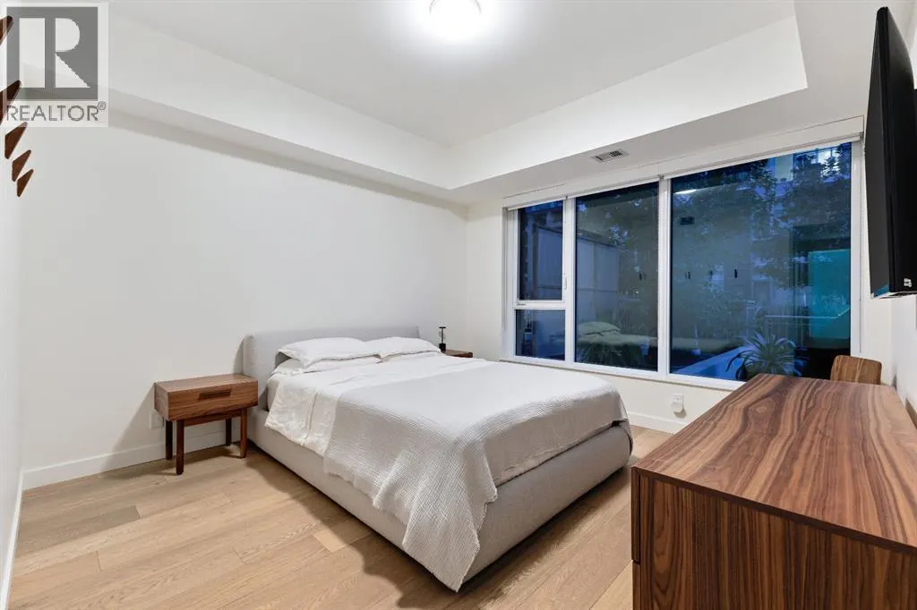 104, 128 Waterfront Court SW