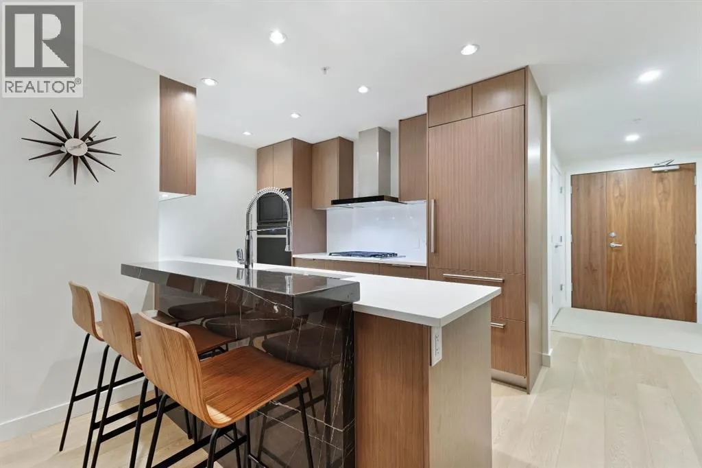 104, 128 Waterfront Court SW