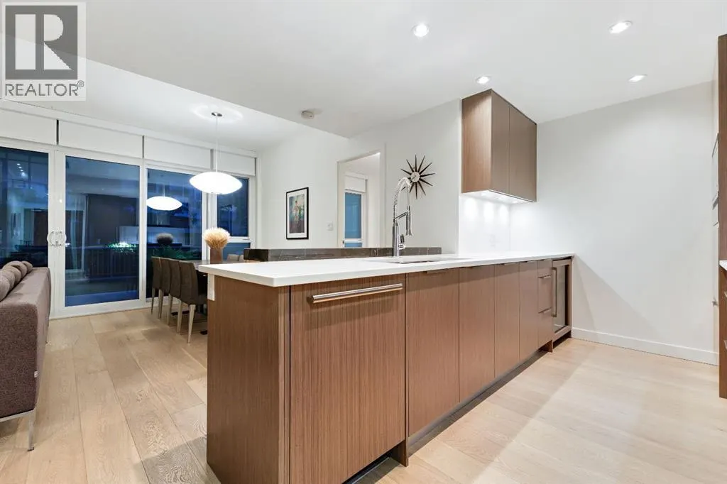104, 128 Waterfront Court SW