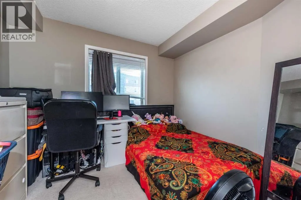 203, 5 Saddlestone Way NE