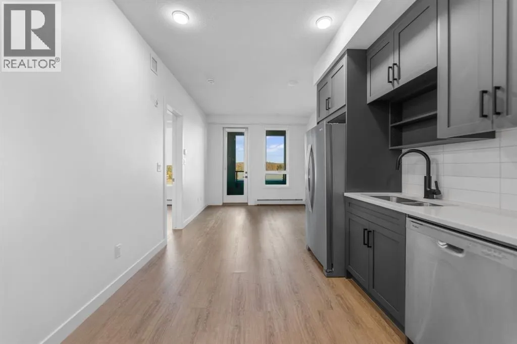 220, 3932 University Avenue NW