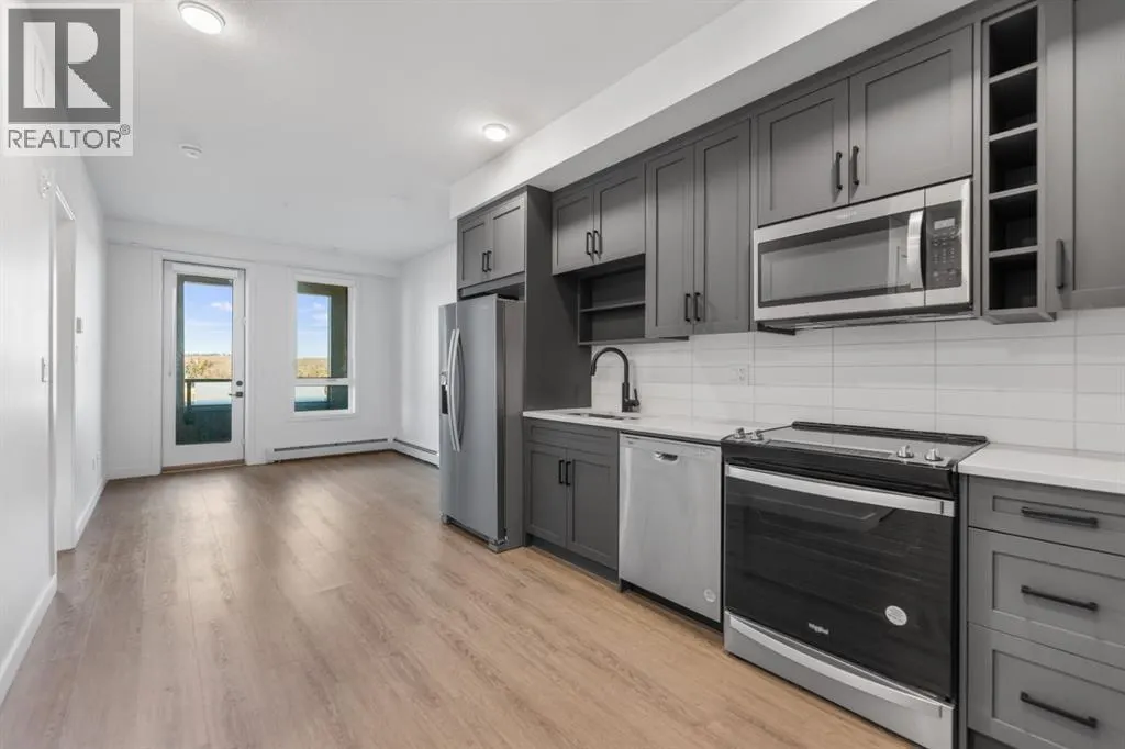 220, 3932 University Avenue NW