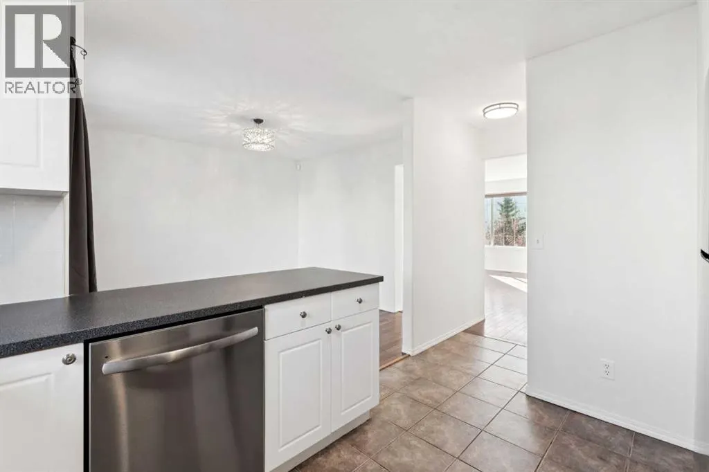 19, 15 Rocky Ridge Gate NW