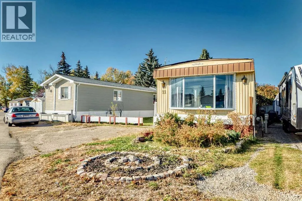 11, 649 Main Street N