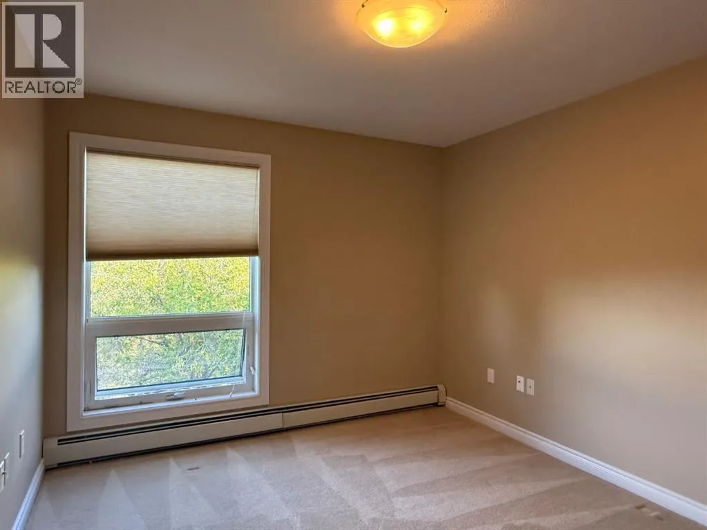 #302, 5015 Riverside Drive