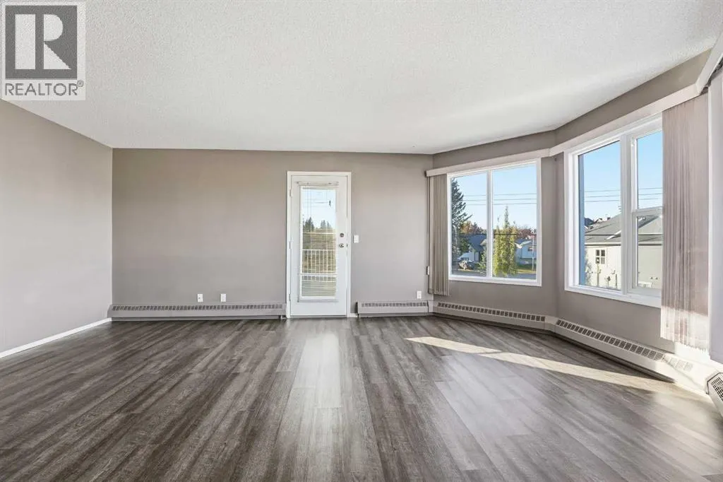 208, 5135 Lakeshore Drive
