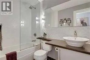 303, 644 Meredith Road NE