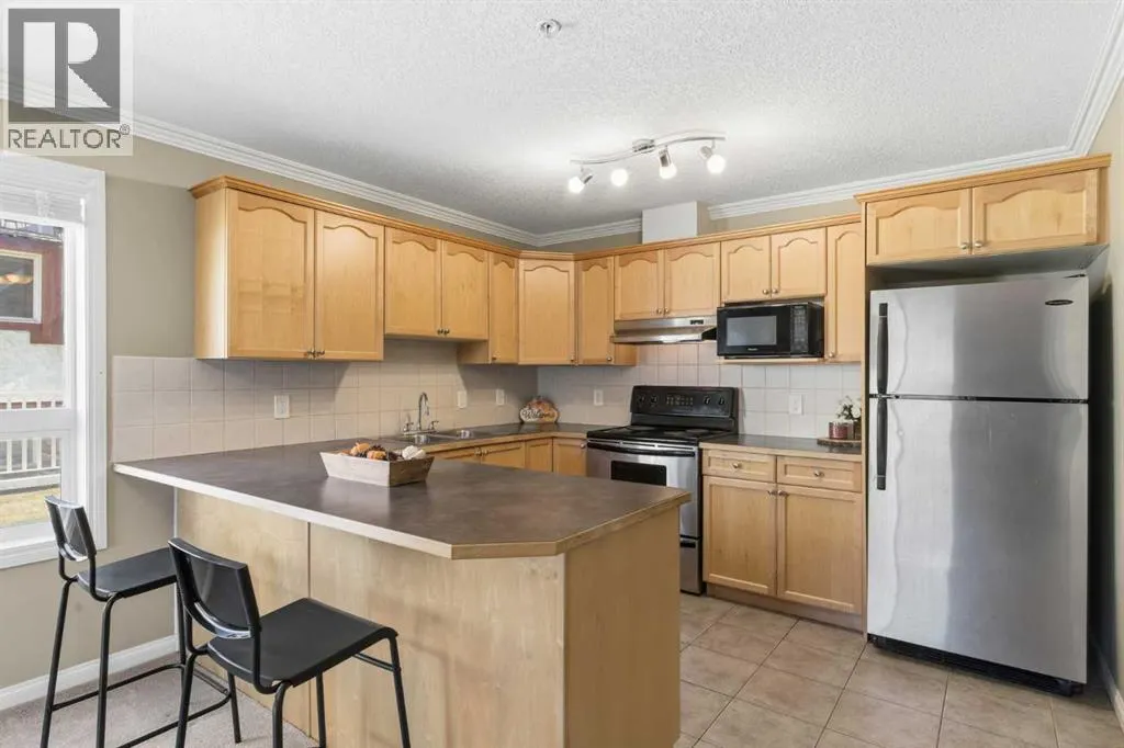 103, 128 Centre Avenue