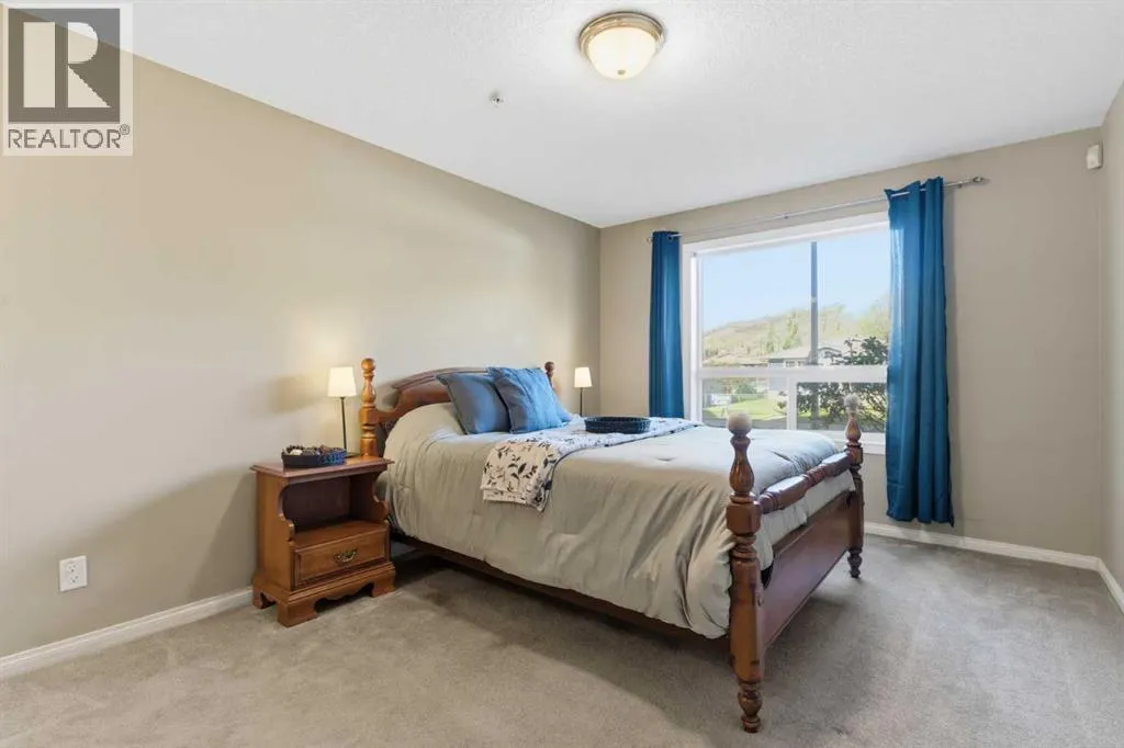 103, 128 Centre Avenue