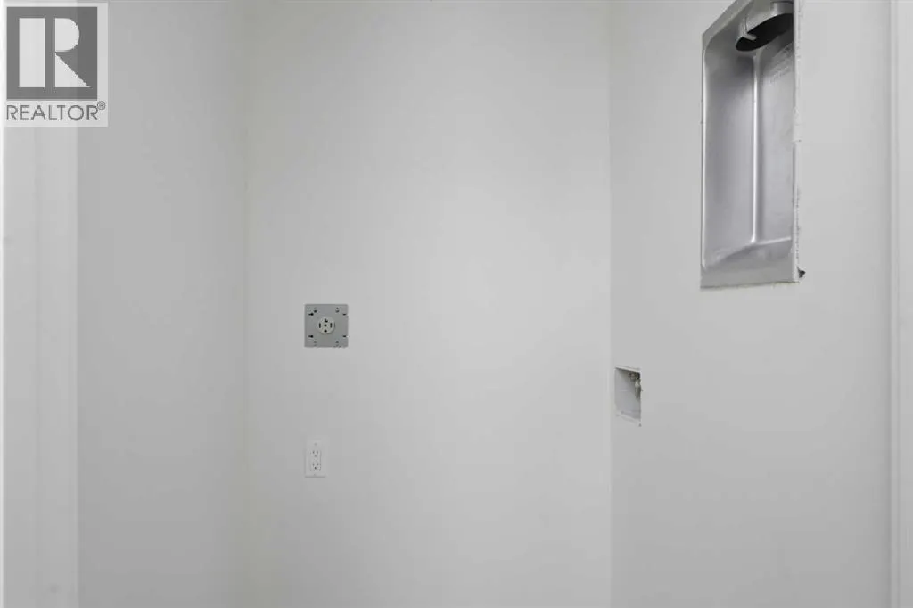 203, 212 32 Avenue NE