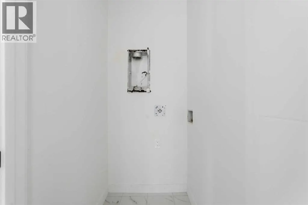 203, 212 32 Avenue NE