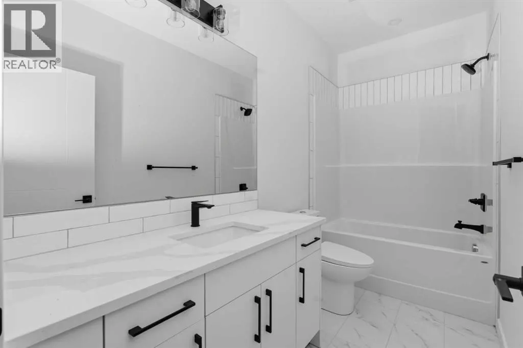 203, 212 32 Avenue NE