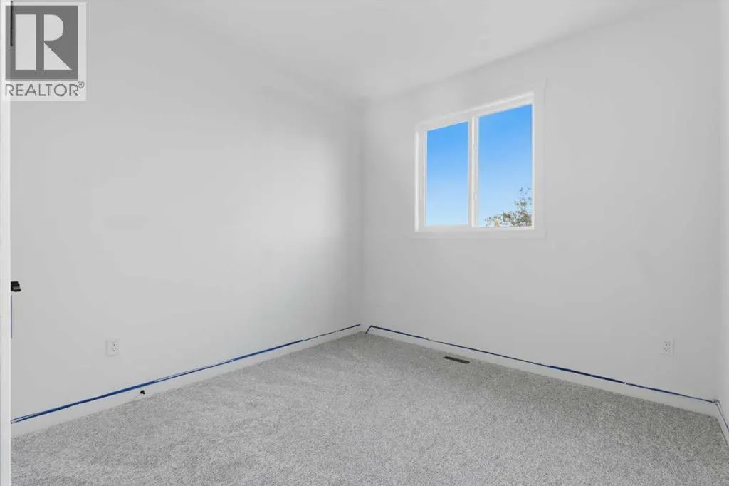 203, 212 32 Avenue NE