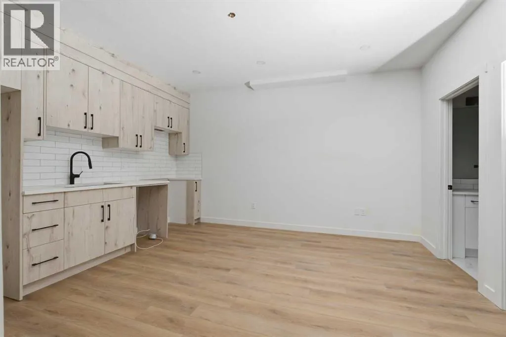 203, 212 32 Avenue NE