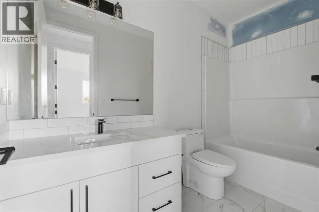 203, 212 32 Avenue NE