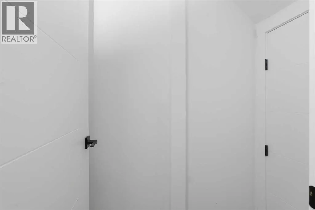 203, 212 32 Avenue NE