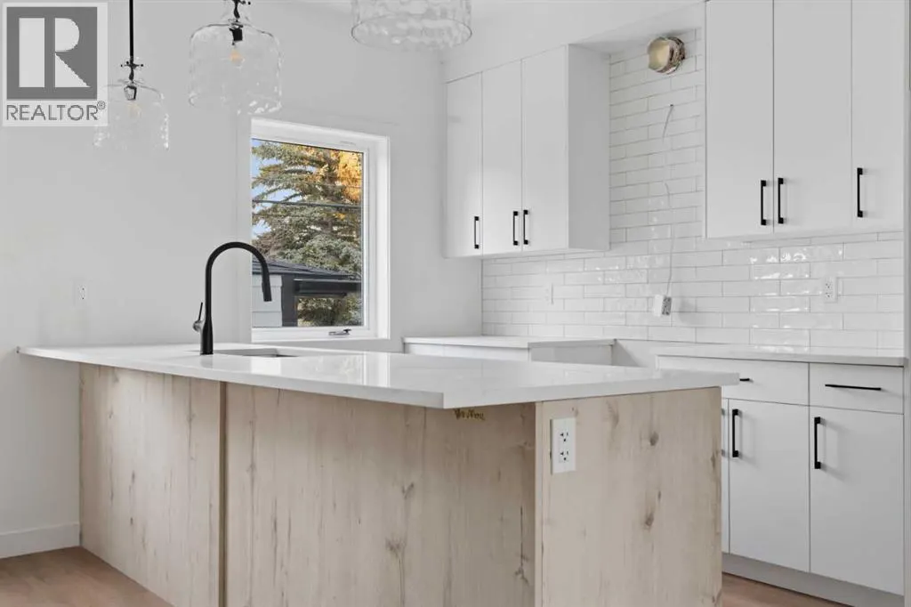 203, 212 32 Avenue NE