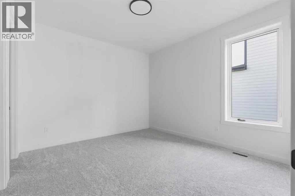 203, 212 32 Avenue NE