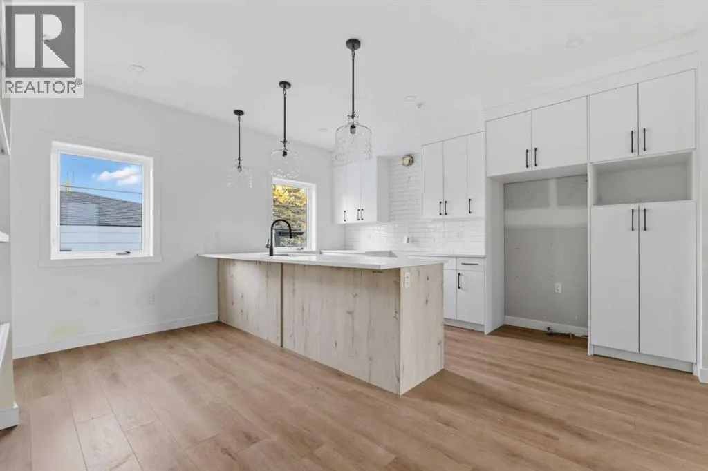 203, 212 32 Avenue NE