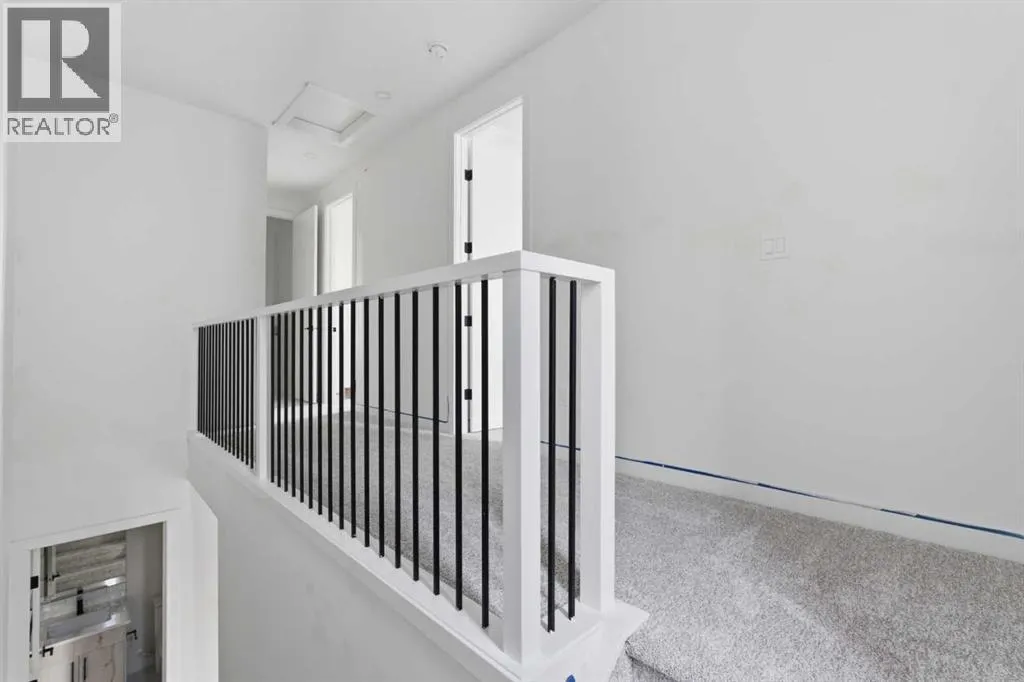 203, 212 32 Avenue NE