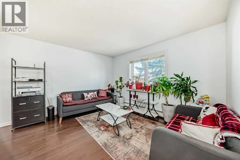 7716 bowness Road NW