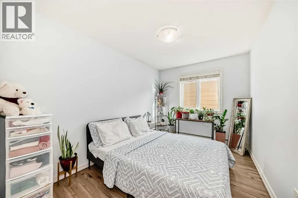 7716 bowness Road NW