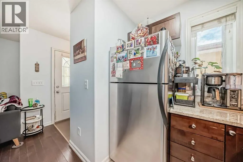 7716 bowness Road NW