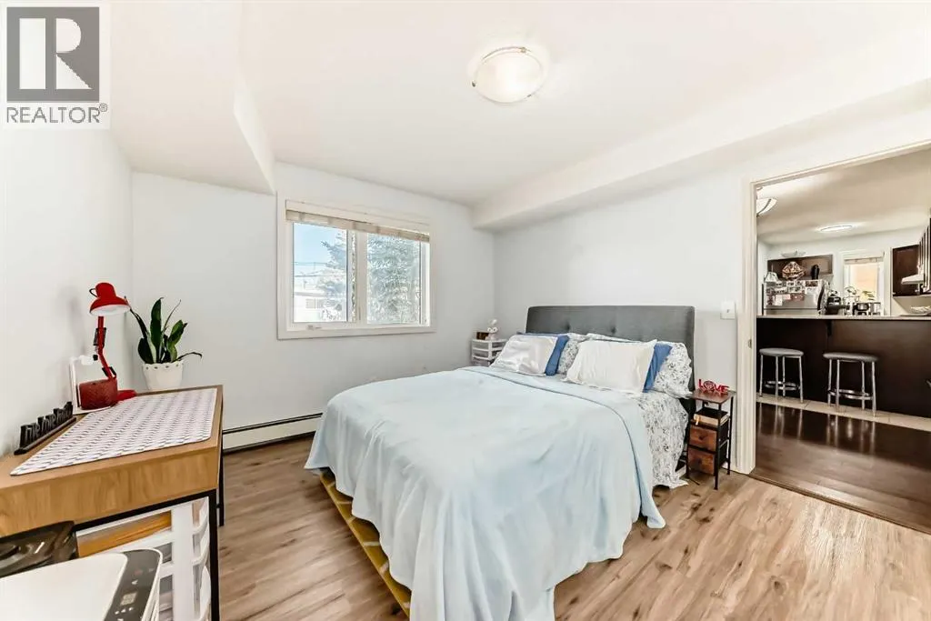 7716 bowness Road NW