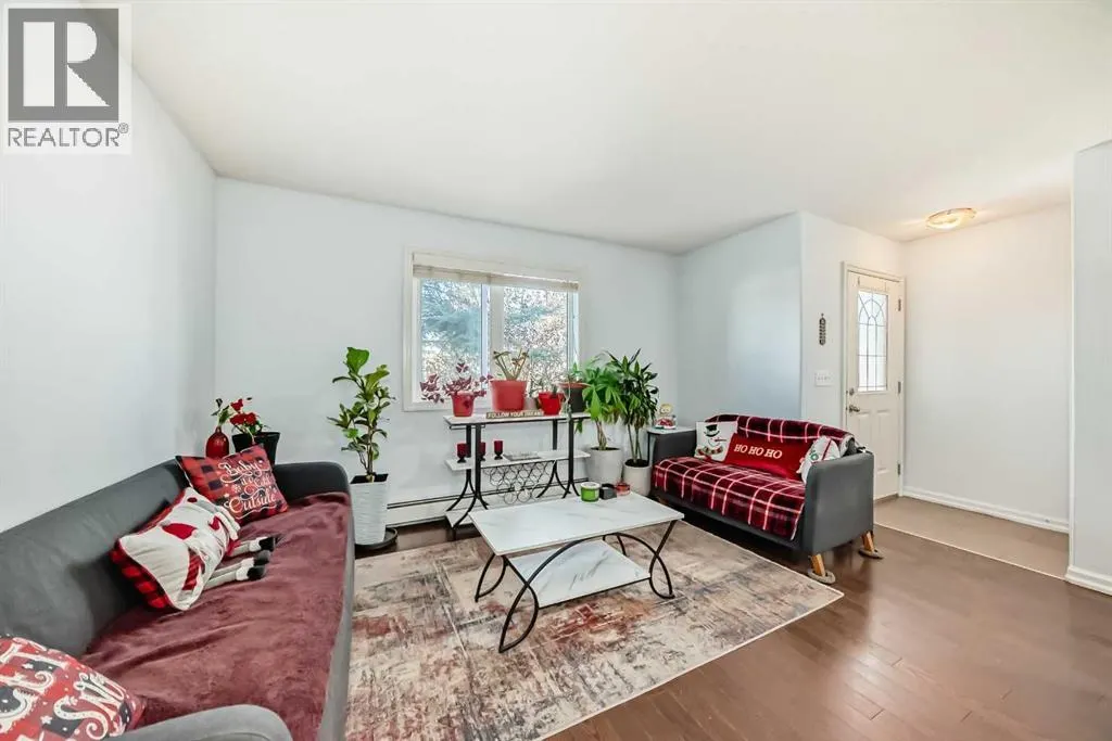 7716 bowness Road NW