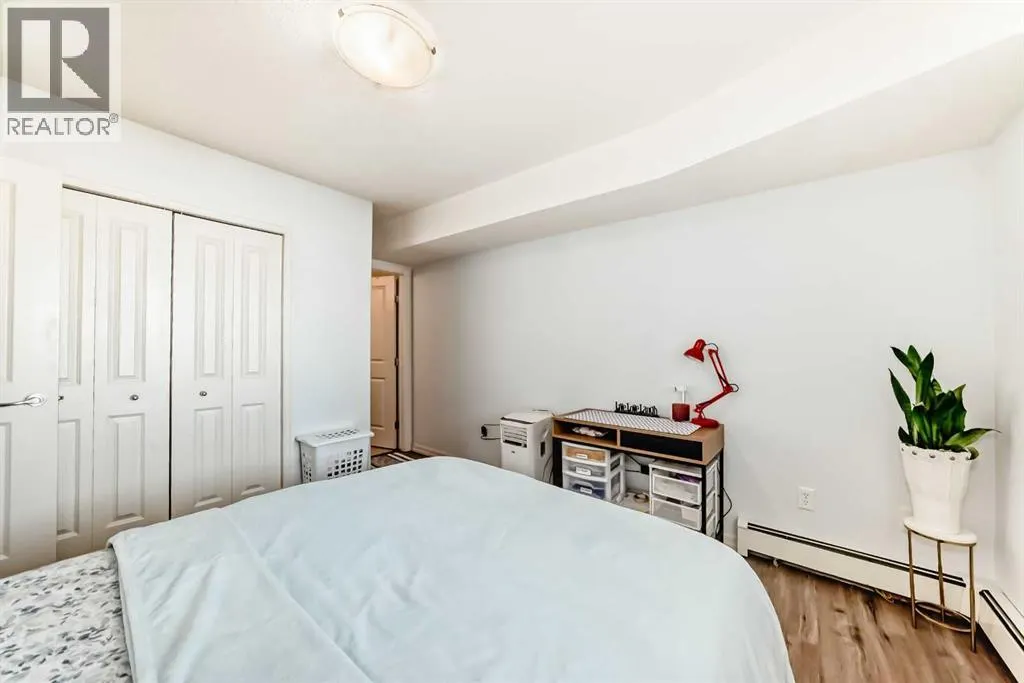 7716 bowness Road NW