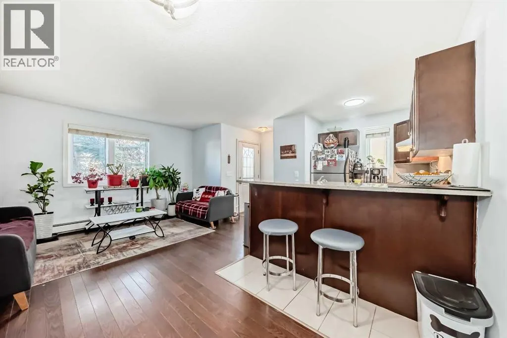 7716 bowness Road NW