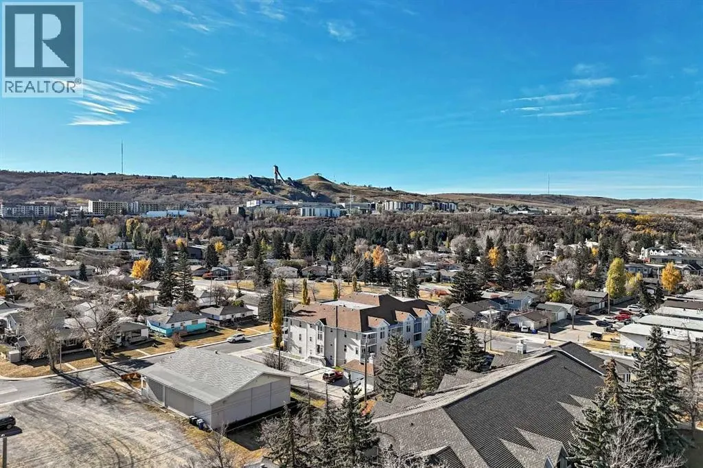 7716 bowness Road NW