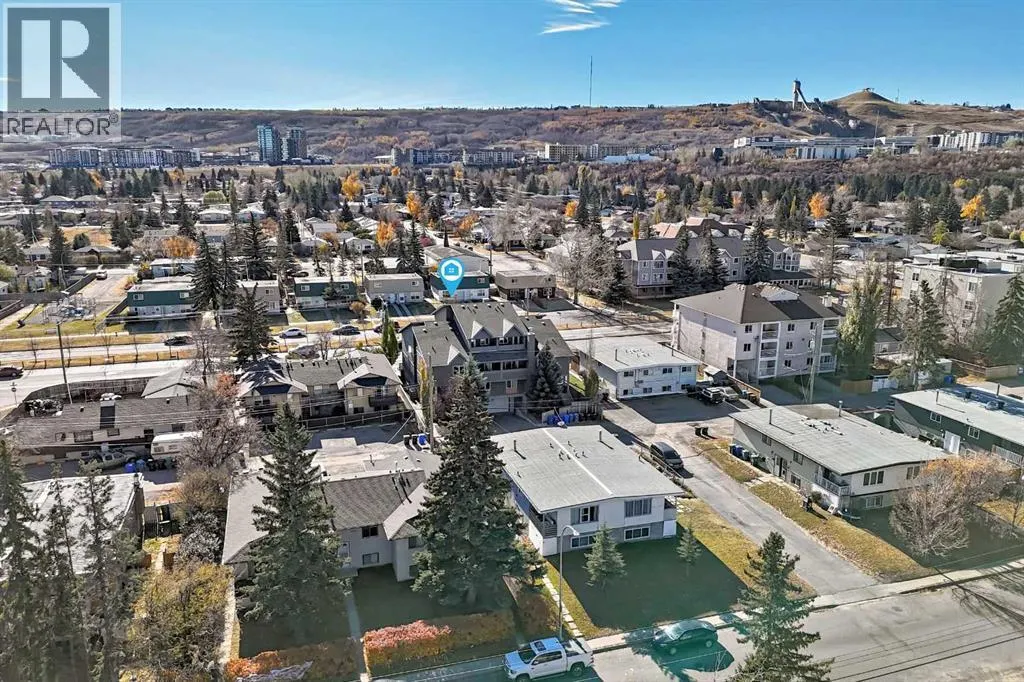 7716 bowness Road NW