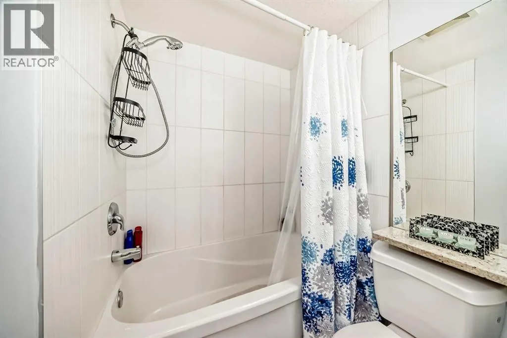 7716 bowness Road NW