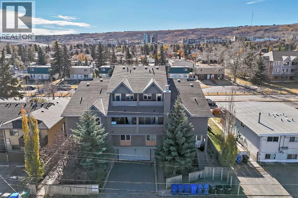 7716 bowness Road NW