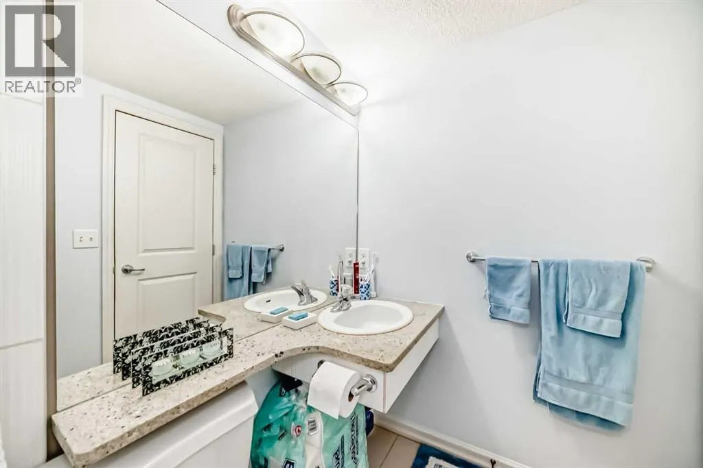 7716 bowness Road NW