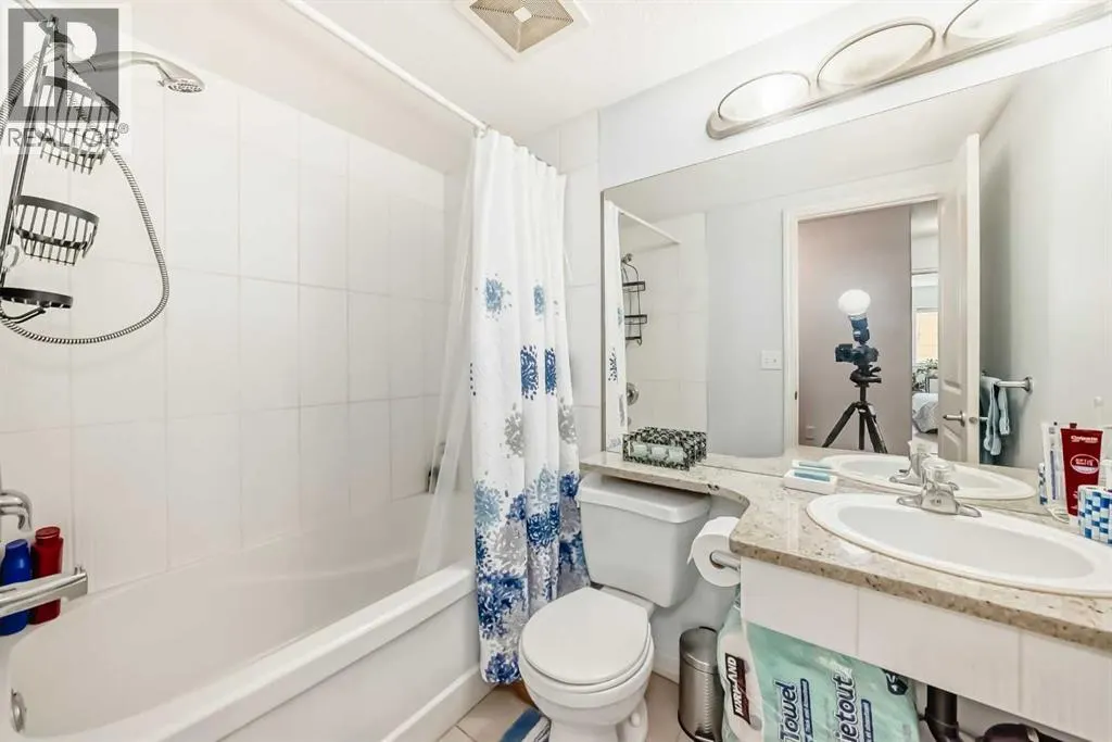 7716 bowness Road NW