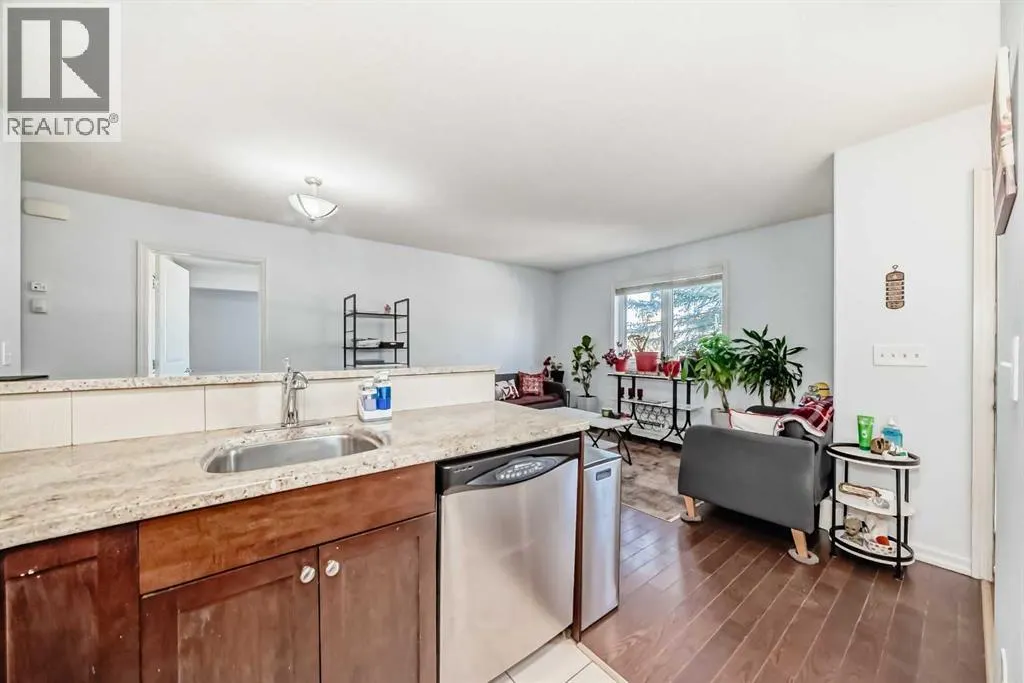 7716 bowness Road NW