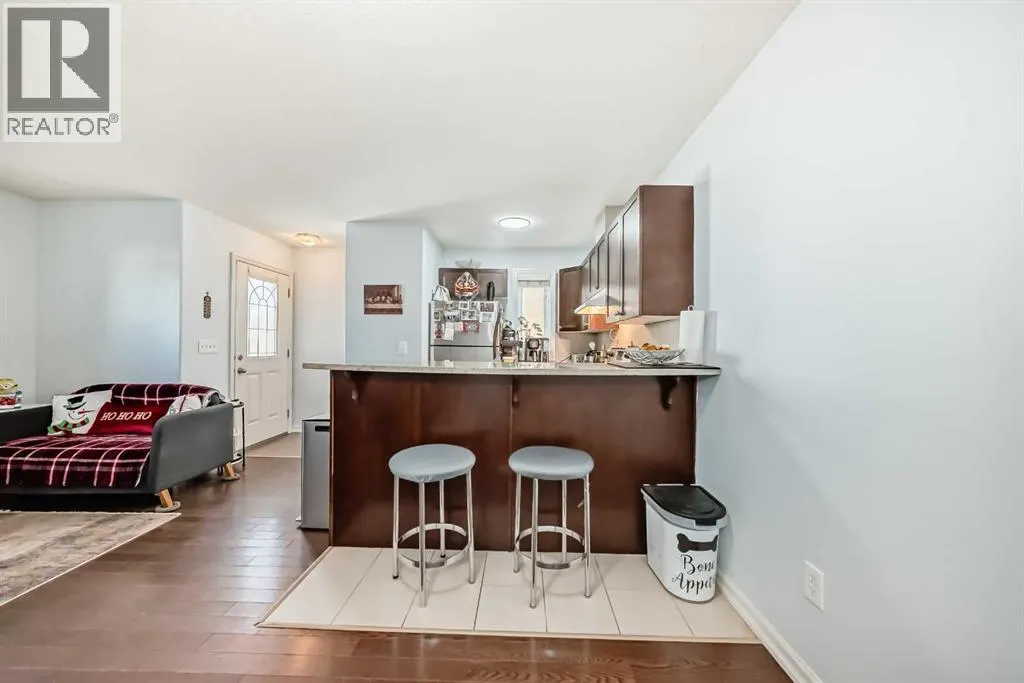 7716 bowness Road NW