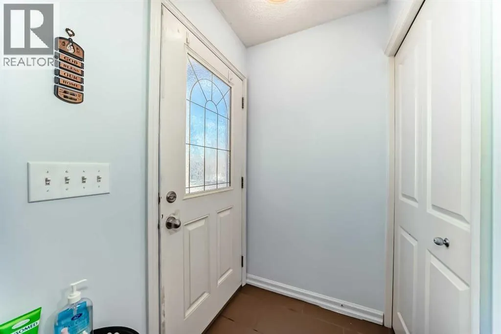 7716 bowness Road NW