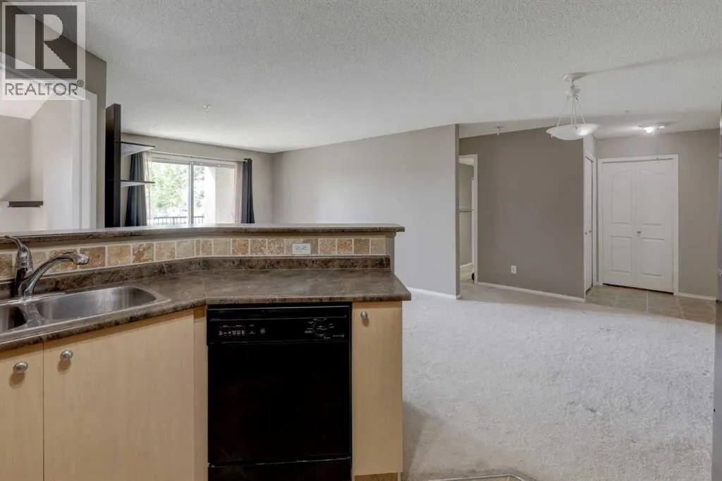 8118, 304 Mackenzie Way SW