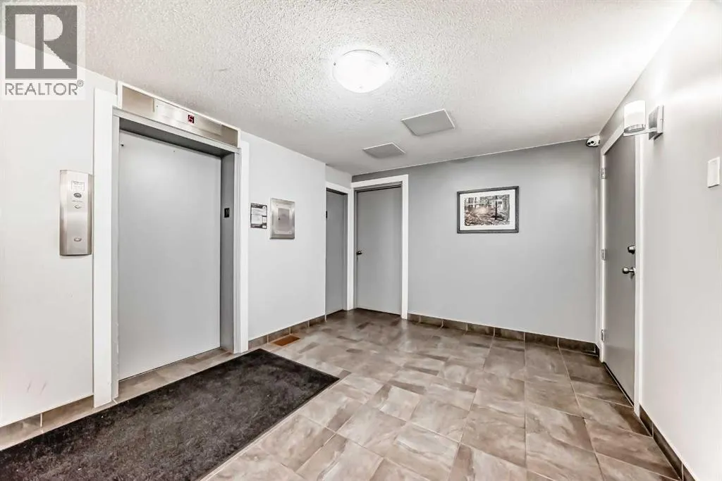 205, 1213 13 Avenue SW