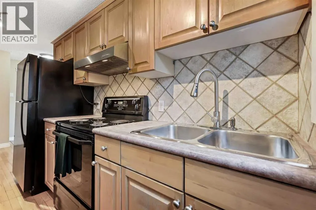 302, 1411 7 Street SW