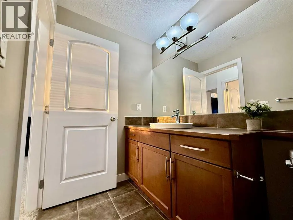 220, 15304 Bannister Road SE