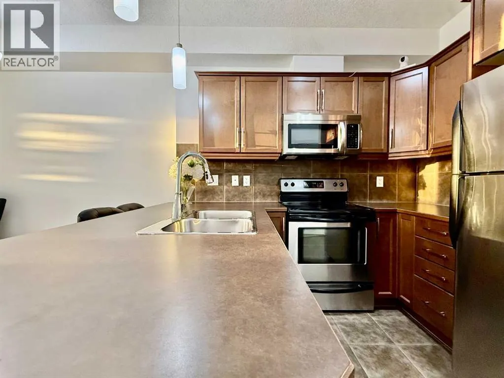 220, 15304 Bannister Road SE